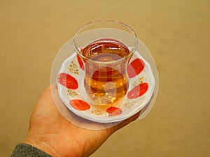 Turkish apple tea in a Turkish glass