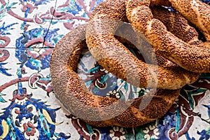 Turkish Bagel Simit on ottoman pattern surface.