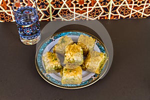 Plate piled with Baclava, elevated photo