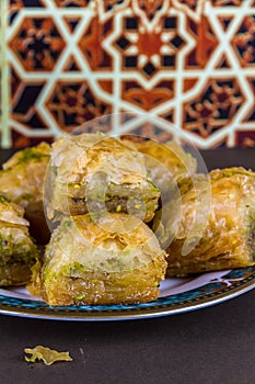 Plate piled with Baclava, close up photo