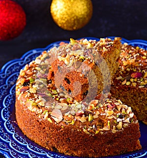 Turkish cake in a blue plate photo