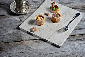 Turkish cofee and Middle Eastern dessert with on a stone plate