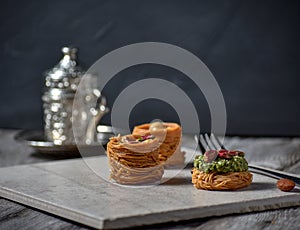 Turkish cofee and Middle Eastern dessert with on a stone plate