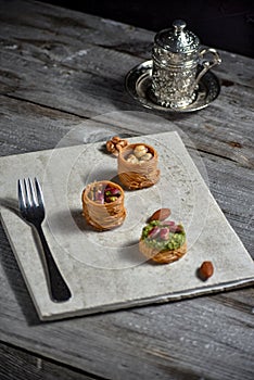 Turkish cofee and Middle Eastern dessert with on a stone plate