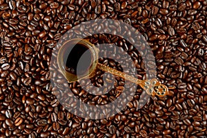 Turkish Coffee on coffee beans background
