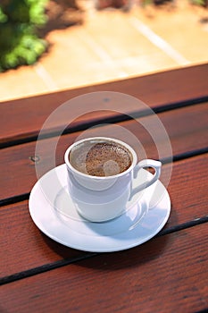 Turkish Coffee Cup on a Wooden Table