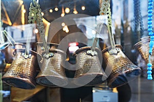 Turkish coffee pots in street coffee shop. Istanbul