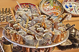 Turkish coffee pots in a street market photo