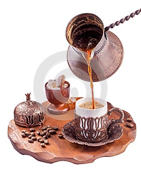 Turkish coffee pouring isolated photo
