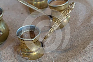 Turkish Coffee prepared in sand