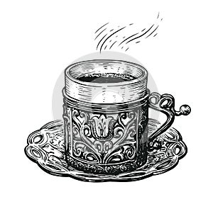 Turkish coffee sketch. Hand drawn cup on a platter. Vintage vector illustration photo