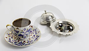 Turkish Coffee with small chocolate with authentic cup