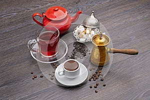 Turkish coffee and tea shot on a wooden background