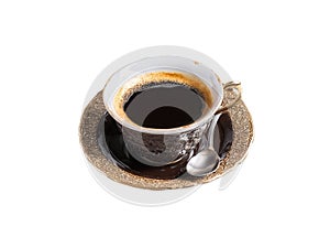 Turkish coffee in a traditional glass cup fine coffee grounds settling moody lighting high detail photo