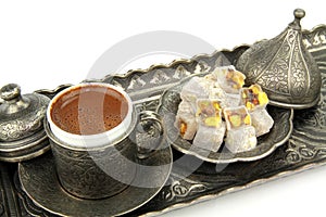 Turkish coffee and turkish delight with traditional cup and tray