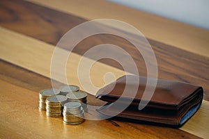 Turkish coin liras and purse on wooden background cleavage for the text available