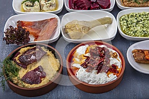 Turkish cuisine appetizers. BalÄ±k restaurant meze Ã§eÅŸitleri; Cold appetizers.Fish and vegetables assortment appetizers. Close-