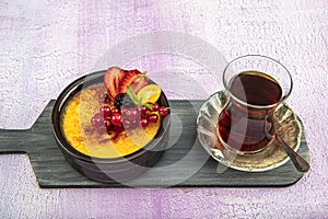 Turkish Cuisine dessert varieties. Muhallebi / Homemade Pudding. Baked rice pudding turkish milk dessert sutlac in earthenware