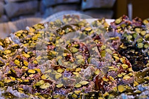 Turkish delight dessert with pistachio in coconut coating