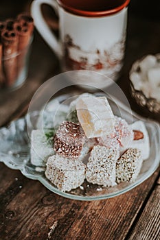 Turkish Delight - a gelatinous sweet confection traditionally made of syrup and cornflour, dusted with icing sugar. Still life