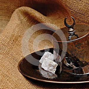 Turkish delight in hand crafted hammered Turkish copper bowl in FEZ Shape. Traditional Anatolian arts.