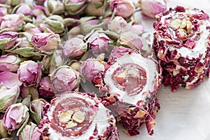 Turkish delight with nuts and rose leaves. Rahat lokum, traditional Turkish sweets, Turkey