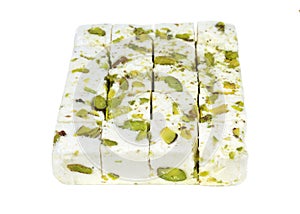 Turkish delight with pistachio nuts isolated on white background