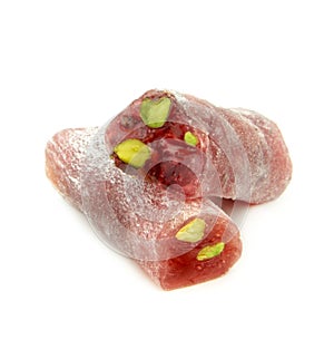 Turkish delight with Pistachio nuts on white background