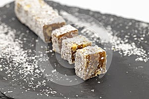 Turkish delight with pomegranate and hazelnut. Traditional Turkish cuisine delicacies