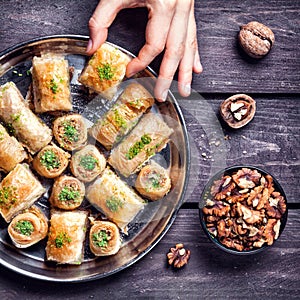 Turkish delights baklava on wooden table photo