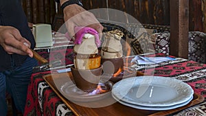 Turkish dish cooked in a clay pot over fire that is broken before being consumed called Testi kebab