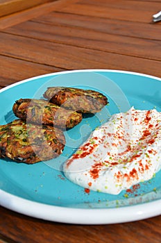 Turkish dish is made with hash browns and yoghurt, hash browns and zucchini.