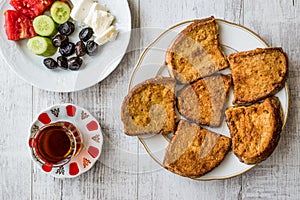 Turkish Egg Bread with tea / Yumurtali ekmek / French Toast. photo