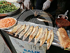 Turkish fast food - Balik Ekmek fish in bread in Istanbul.