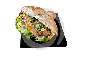 Turkish fish sandwich with grilled mackerel fillet Balik Ekmek. Isolated on white background. Top view.