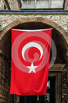 Turkish flag on the entrance to museum Hagia Sophia, Istanbul, T