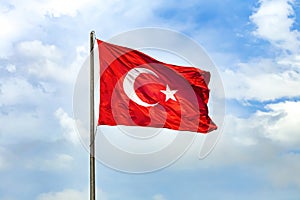 The Turkish flag is the national and official flag of the Republic of Turkey. [1] It is formed with a white crescent and star on a photo