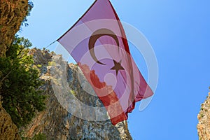 Turkish flag in Saklikent Canyon. Natural attraction, popular place for tourists to visit