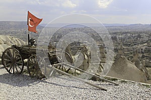 Turkish flag on a wagon and a rock desert