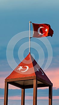 Turkish flag waving at blue sky. Turkey country flag flowing in the wind at blue sky