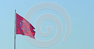 Turkish flag waving at blue sky. Turkey country flag in the wind at blue sky