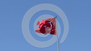 Turkish flag waving on the clean sky
