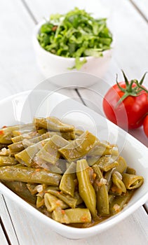 Turkish food, green bean with oil and tomato photo