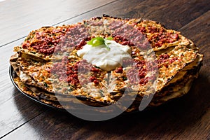 Turkish Food Kayseri YaÃÅ¸lama with Minced Meat, Yogurt and Tomate Paste. photo