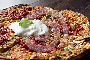 Turkish Food Kayseri YaÃÅ¸lama with Minced Meat, Yogurt and Tomate Paste. photo