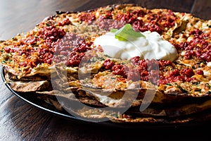 Turkish Food Kayseri YaÃÅ¸lama with Minced Meat, Yogurt and Tomate Paste. photo