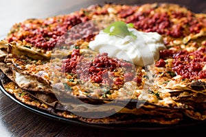 Turkish Food Kayseri YaÄŸlama with Minced Meat, Yogurt and Tomate Paste.