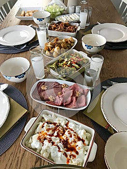 Turkish, Greek Traditional Dinning Table with Special Alcohol Drink Raki Ouzo and Mezze Appetizer