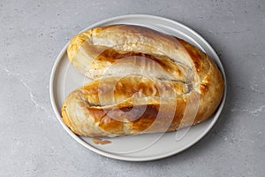 Turkish Kol Borek with minced meat serving