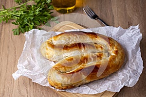 Turkish Kol Borek with minced meat serving